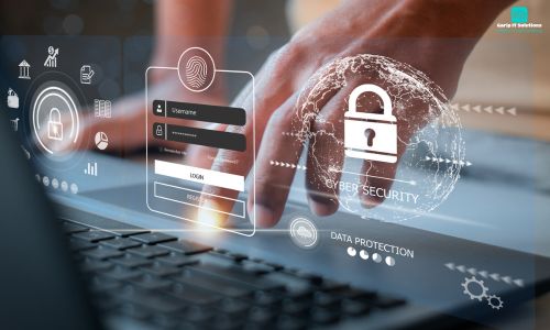 a hand touching a keyboard with a screen showing a login form